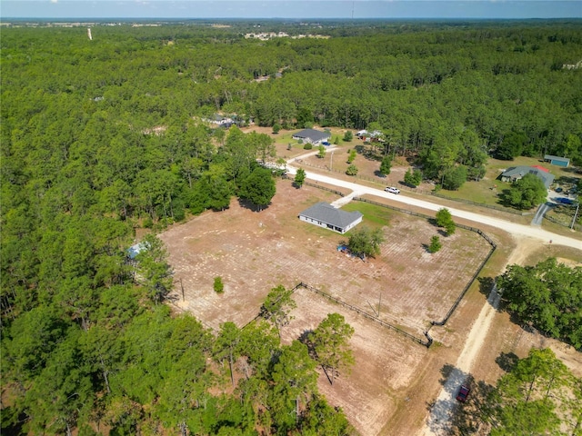12396 SW 64th Street Rd, Ocala, FL 34481 - aerial overview of property's location with a heavily wooded area