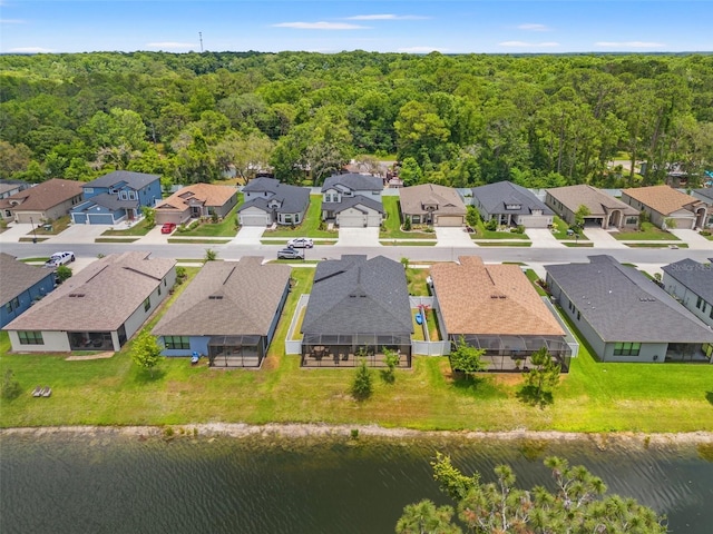 11579 Weaver Hollow Rd, New Port Richey, FL 34654 - aerial perspective of suburban area with a large body of water and a forest