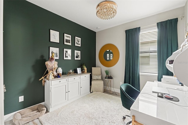 11579 Weaver Hollow Rd, New Port Richey, FL 34654 - carpeted home office featuring baseboards and a chandelier