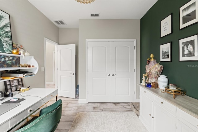 11579 Weaver Hollow Rd, New Port Richey, FL 34654 - office featuring light wood-style floors and baseboards