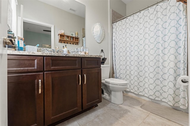 11579 Weaver Hollow Rd, New Port Richey, FL 34654 - full bathroom featuring toilet, vanity, tile patterned flooring, and a shower with shower curtain