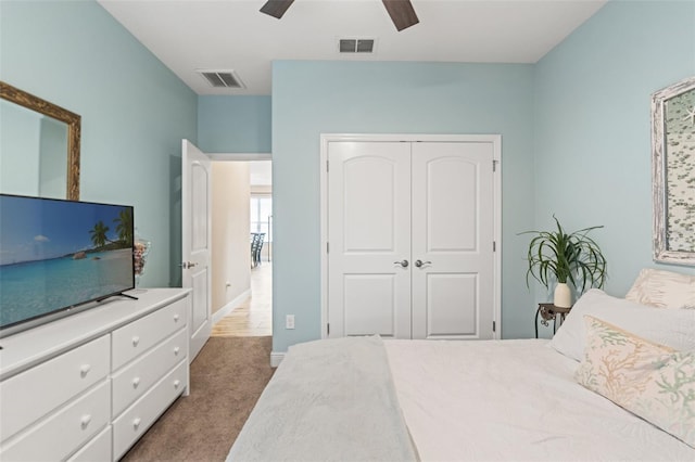 11579 Weaver Hollow Rd, New Port Richey, FL 34654 - carpeted bedroom with a closet, ceiling fan, and baseboards