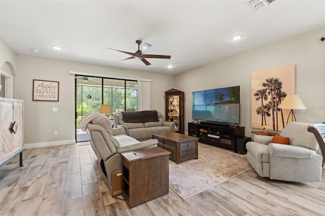 11579 Weaver Hollow Rd, New Port Richey, FL 34654 - living area with ceiling fan, light wood-type flooring, recessed lighting, and baseboards