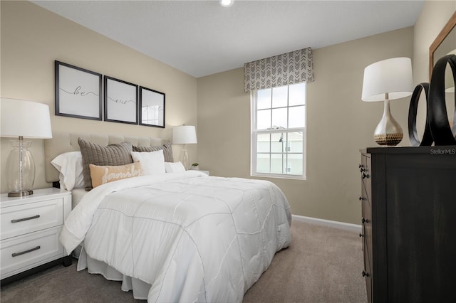 2307 Incandescent Way S, Daytona, FL 32119 - bedroom featuring dark colored carpet and baseboards