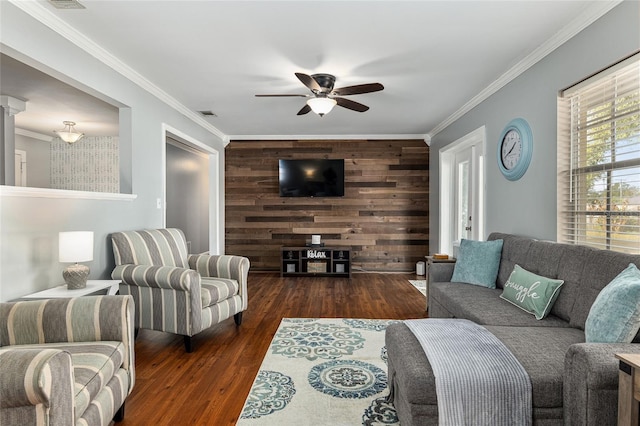 4851 NE 7th St, Ocala, FL 34470 - living area featuring a ceiling fan, wood finished floors, and crown molding