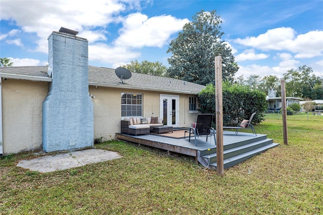4851 NE 7th St, Ocala, FL 34470 - back of house featuring an outdoor living space, a wooden deck, stucco siding, a chimney, and french doors