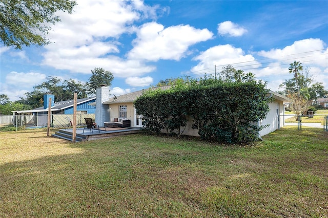 4851 NE 7th St, Ocala, FL 34470 - back of property with stucco siding and a deck