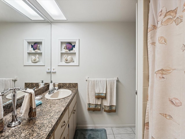 3832 Sailmaker Ln Unit 3832, Holiday, FL 34691 - full bathroom featuring vanity, baseboards, and a shower with shower curtain
