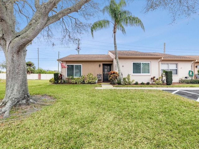 3832 Sailmaker Ln Unit 3832, Holiday, FL 34691 - ranch-style home featuring stucco siding, a shingled roof, and uncovered parking