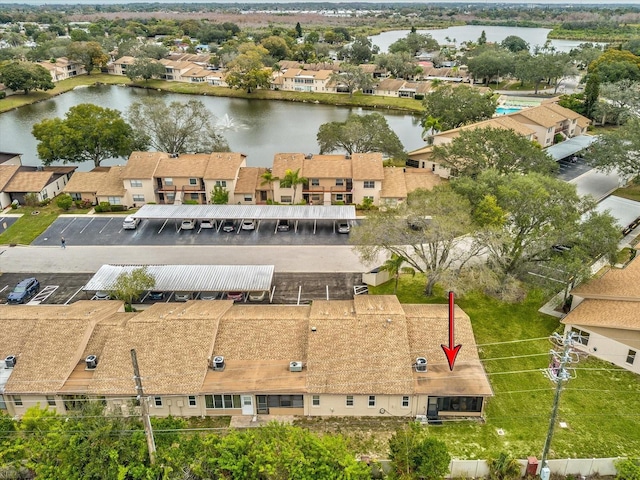 3832 Sailmaker Ln Unit 3832, Holiday, FL 34691 - aerial perspective of suburban area with a large body of water