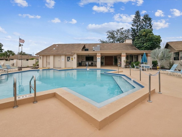 3832 Sailmaker Ln Unit 3832, Holiday, FL 34691 - community pool featuring a patio area