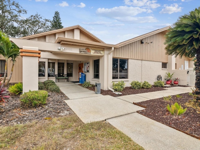 3832 Sailmaker Ln Unit 3832, Holiday, FL 34691 - view of front of home with stucco siding