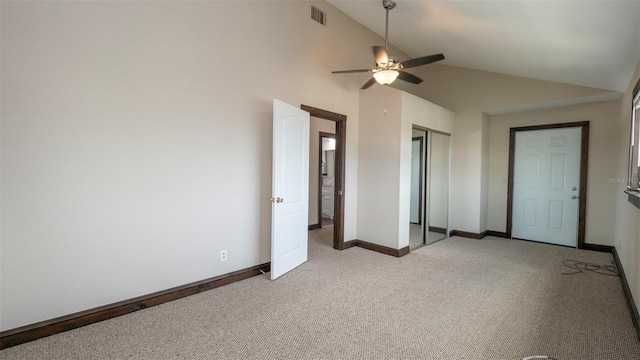 6322 Aureau Ave, Hudson, FL 34667 - unfurnished bedroom with vaulted ceiling, light colored carpet, baseboards, a closet, and ceiling fan