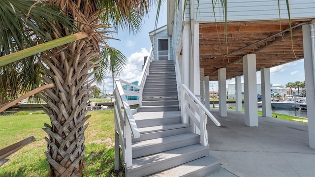 6322 Aureau Ave, Hudson, FL 34667 - stairs featuring a water view