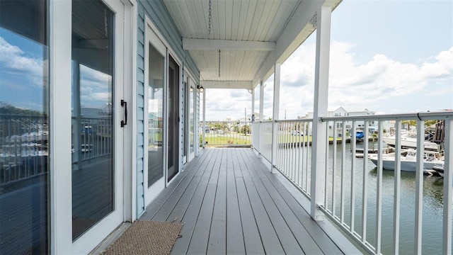 6322 Aureau Ave, Hudson, FL 34667 - wooden terrace with a water view