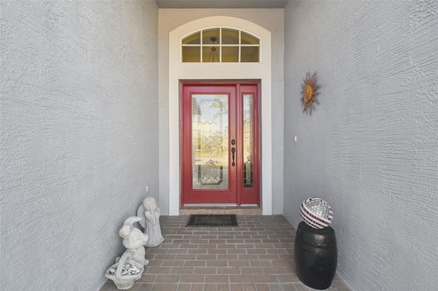 11637 Spindrift Loop, Hudson, FL 34667 - view of exterior entry with stucco siding