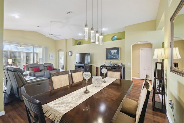 11637 Spindrift Loop, Hudson, FL 34667 - dining space with arched walkways, wood finished floors, lofted ceiling, and ceiling fan