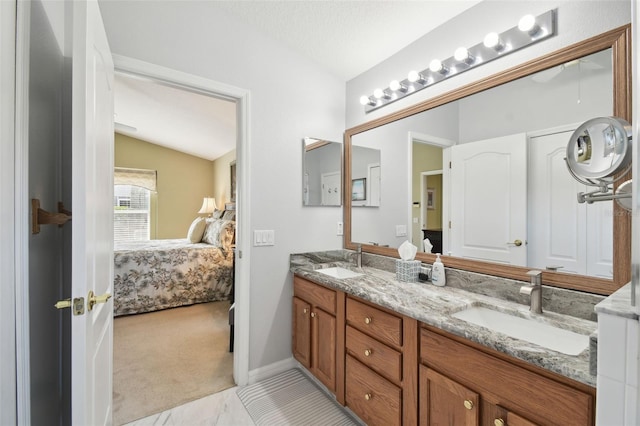 11637 Spindrift Loop, Hudson, FL 34667 - ensuite bathroom with double vanity and lofted ceiling