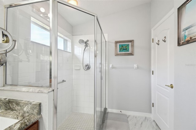 11637 Spindrift Loop, Hudson, FL 34667 - full bathroom featuring a shower stall, vanity, and marble finish floors