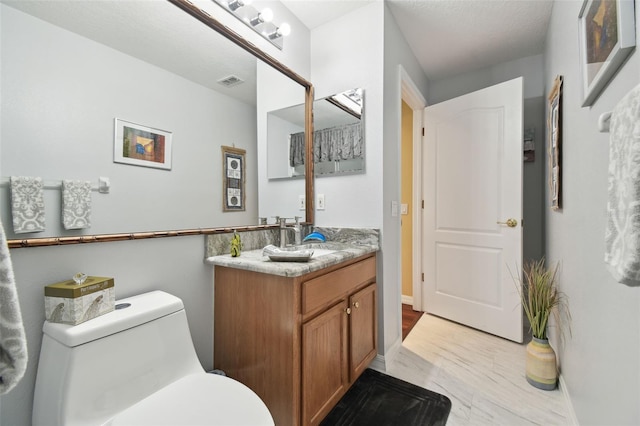 11637 Spindrift Loop, Hudson, FL 34667 - bathroom featuring vanity and marble finish floors
