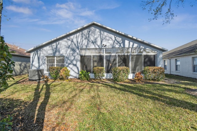 11637 Spindrift Loop, Hudson, FL 34667 - rear view of house with a yard