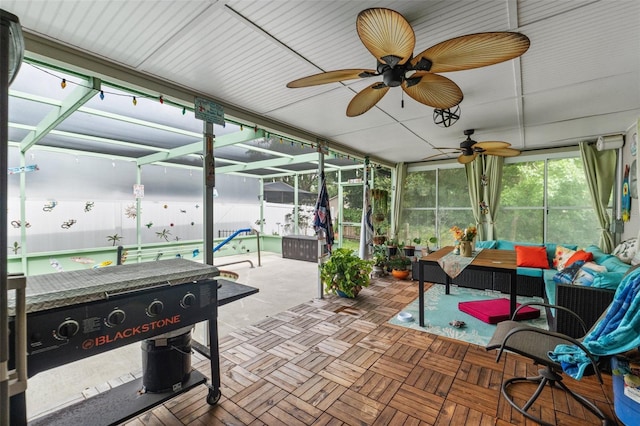 4350 Sawgrass Blvd, New Port Richey, FL 34653 - sunroom / solarium with ceiling fan and an outdoor hangout area