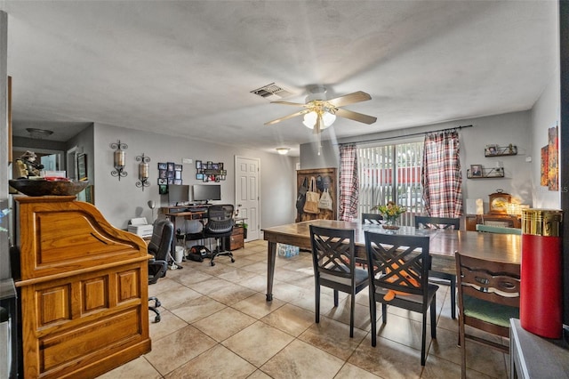 4350 Sawgrass Blvd, New Port Richey, FL 34653 - dining space with an office area, ceiling fan, and light tile patterned flooring