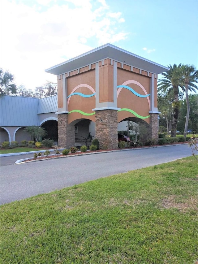 11715 Boynton Ln Unit 74B, New Port Richey, FL 34654 - community / neighborhood sign with a yard