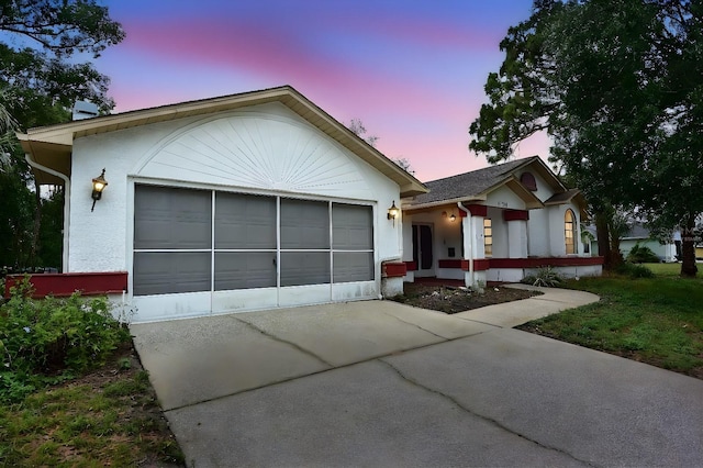 11364 Orangewood Ct, Spring Hill, FL 34609 - ranch-style home featuring stucco siding and driveway