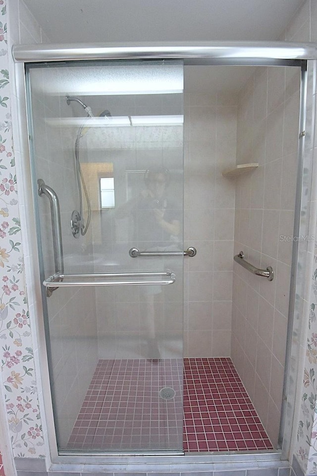 11364 Orangewood Ct, Spring Hill, FL 34609 - bathroom featuring a stall shower