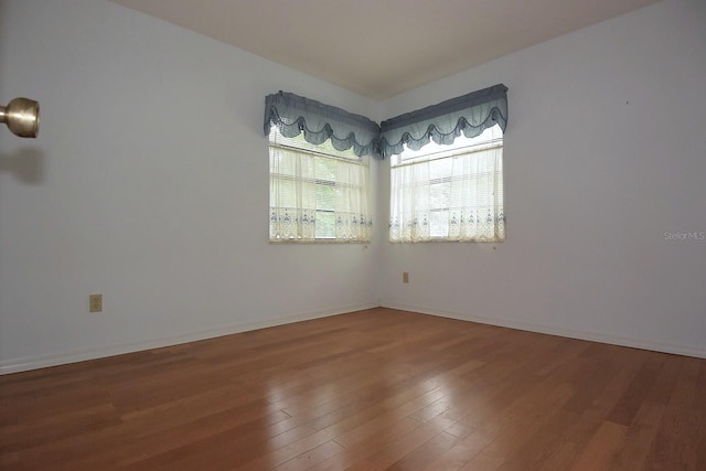 11364 Orangewood Ct, Spring Hill, FL 34609 - spare room with wood finished floors