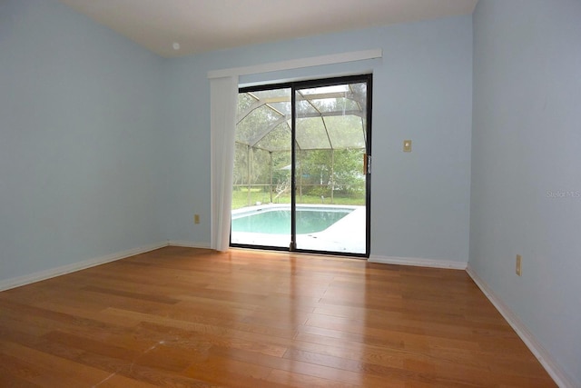 11364 Orangewood Ct, Spring Hill, FL 34609 - spare room with light wood finished floors and baseboards
