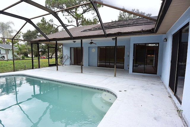 11364 Orangewood Ct, Spring Hill, FL 34609 - swimming pool with a patio area, a ceiling fan, and glass enclosure