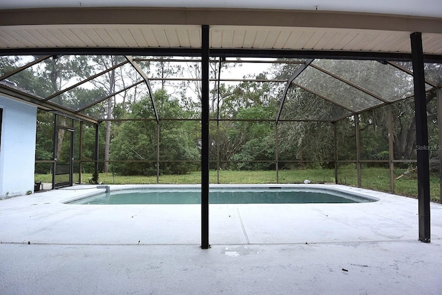 11364 Orangewood Ct, Spring Hill, FL 34609 - swimming pool featuring a lanai and a patio