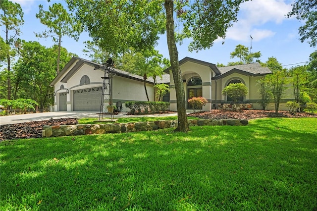 8518 Quail Hollow Blvd, Wesley Chapel, FL 33544 - view of front of home featuring stucco siding, a front yard, driveway, and a garage