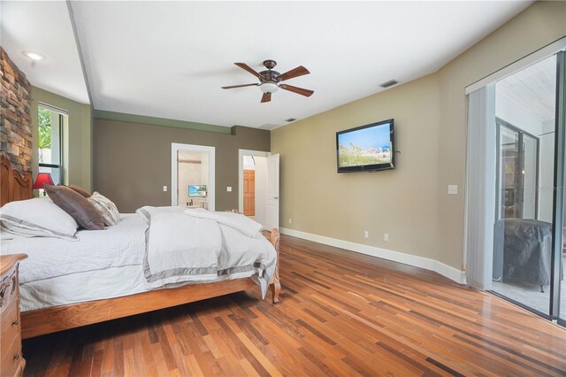 8518 Quail Hollow Blvd, Wesley Chapel, FL 33544 - bedroom with baseboards, wood finished floors, access to outside, and a ceiling fan