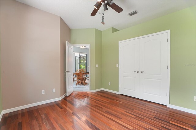 8518 Quail Hollow Blvd, Wesley Chapel, FL 33544 - unfurnished bedroom with wood finished floors and baseboards