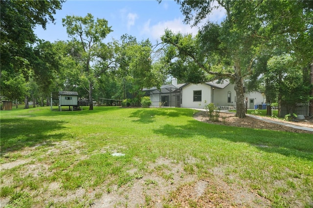 8518 Quail Hollow Blvd, Wesley Chapel, FL 33544 - view of grassy yard featuring a lanai