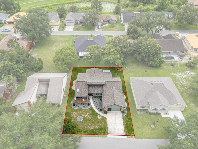35046 Smoketree Ln, Dade City, FL 33523 - aerial perspective of suburban area with property parcel outlined