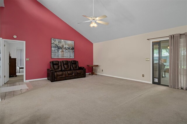35046 Smoketree Ln, Dade City, FL 33523 - unfurnished living room featuring high vaulted ceiling, carpet floors, and ceiling fan