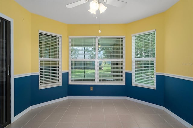 35046 Smoketree Ln, Dade City, FL 33523 - unfurnished room featuring a ceiling fan and tile patterned floors