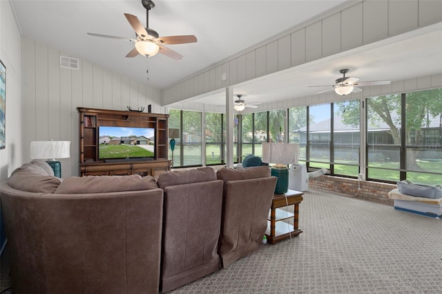 35046 Smoketree Ln, Dade City, FL 33523 - carpeted living area featuring vaulted ceiling and ceiling fan