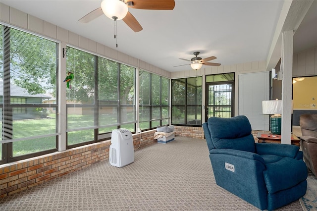 35046 Smoketree Ln, Dade City, FL 33523 - sunroom featuring a ceiling fan and an outdoor living space