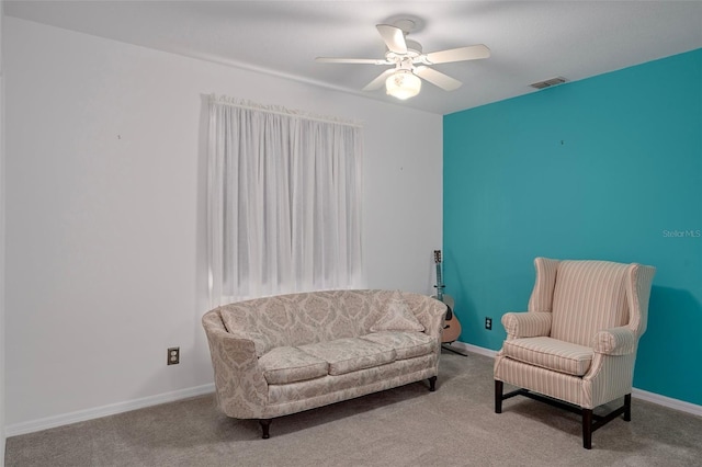 35046 Smoketree Ln, Dade City, FL 33523 - living area with ceiling fan and carpet flooring