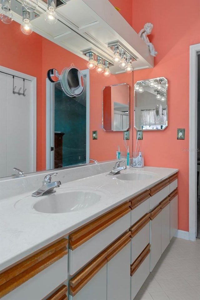 35046 Smoketree Ln, Dade City, FL 33523 - bathroom featuring double vanity and tile patterned floors