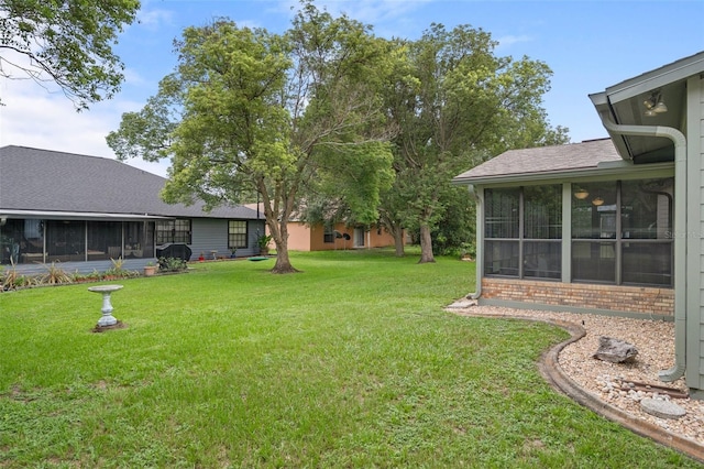 35046 Smoketree Ln, Dade City, FL 33523 - view of grassy yard with a sunroom
