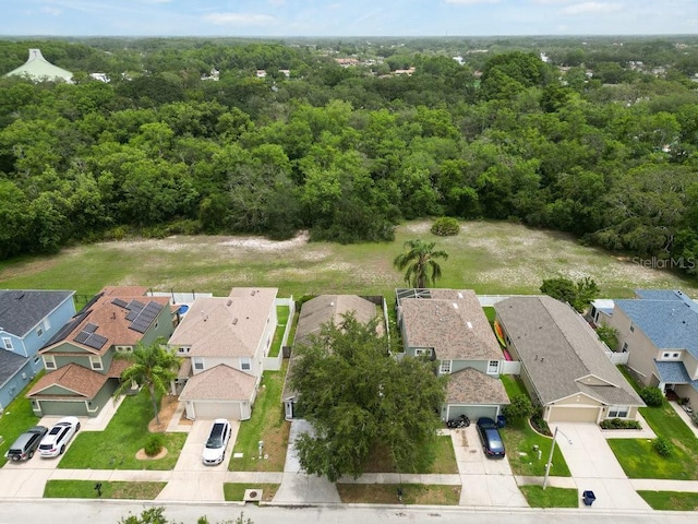 8335 Crescent Moon Dr, New Port Richey, FL 34655 - aerial view of residential area with a heavily wooded area