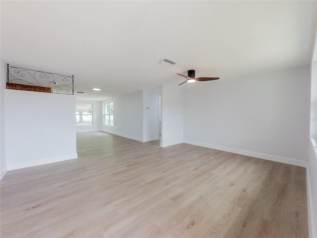 7608 Bougenville Dr, Port Richey, FL 34668 - unfurnished room with light wood-style floors, ceiling fan, baseboards, and recessed lighting