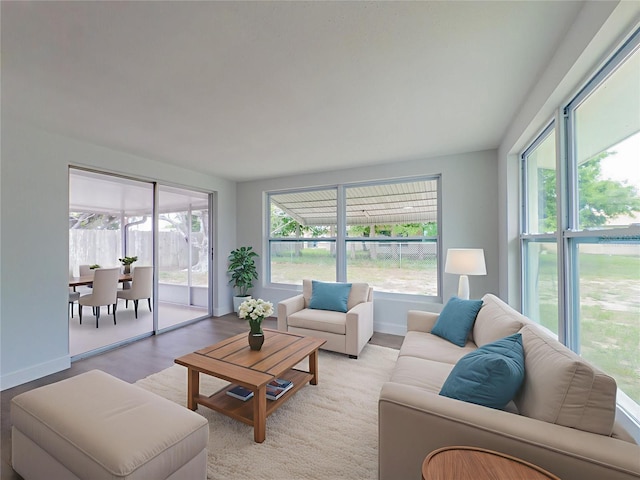 7608 Bougenville Dr, Port Richey, FL 34668 - living area with light wood finished floors and baseboards