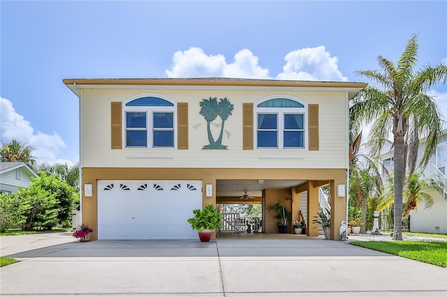 4460 Flounder Dr, Hernando Beach, FL 34607 - view of front of property with driveway and an attached garage